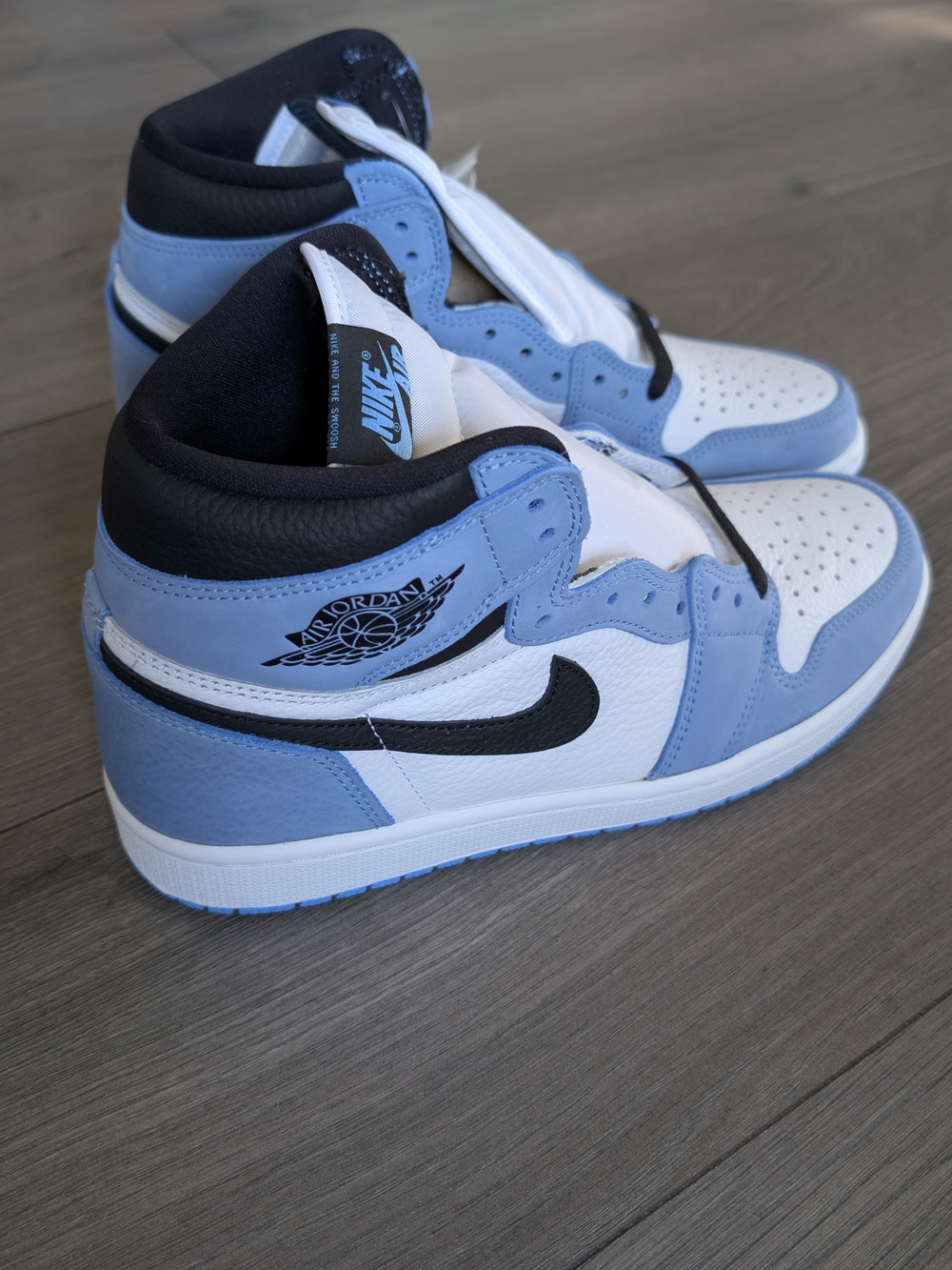Jordan High-Top Sneakers in University Blue / White